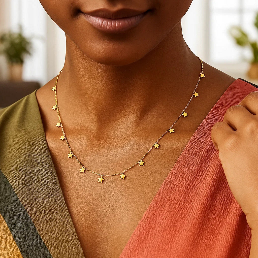 Cadena de oro amarillo de 14K con estrellas colgantes